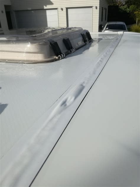 1 Gave the caravan a good cleaning today and noticed that the tape which covers the rear roof joint that goes across the caravan had been damaged by a treehedge bough. . Caravan joint tape